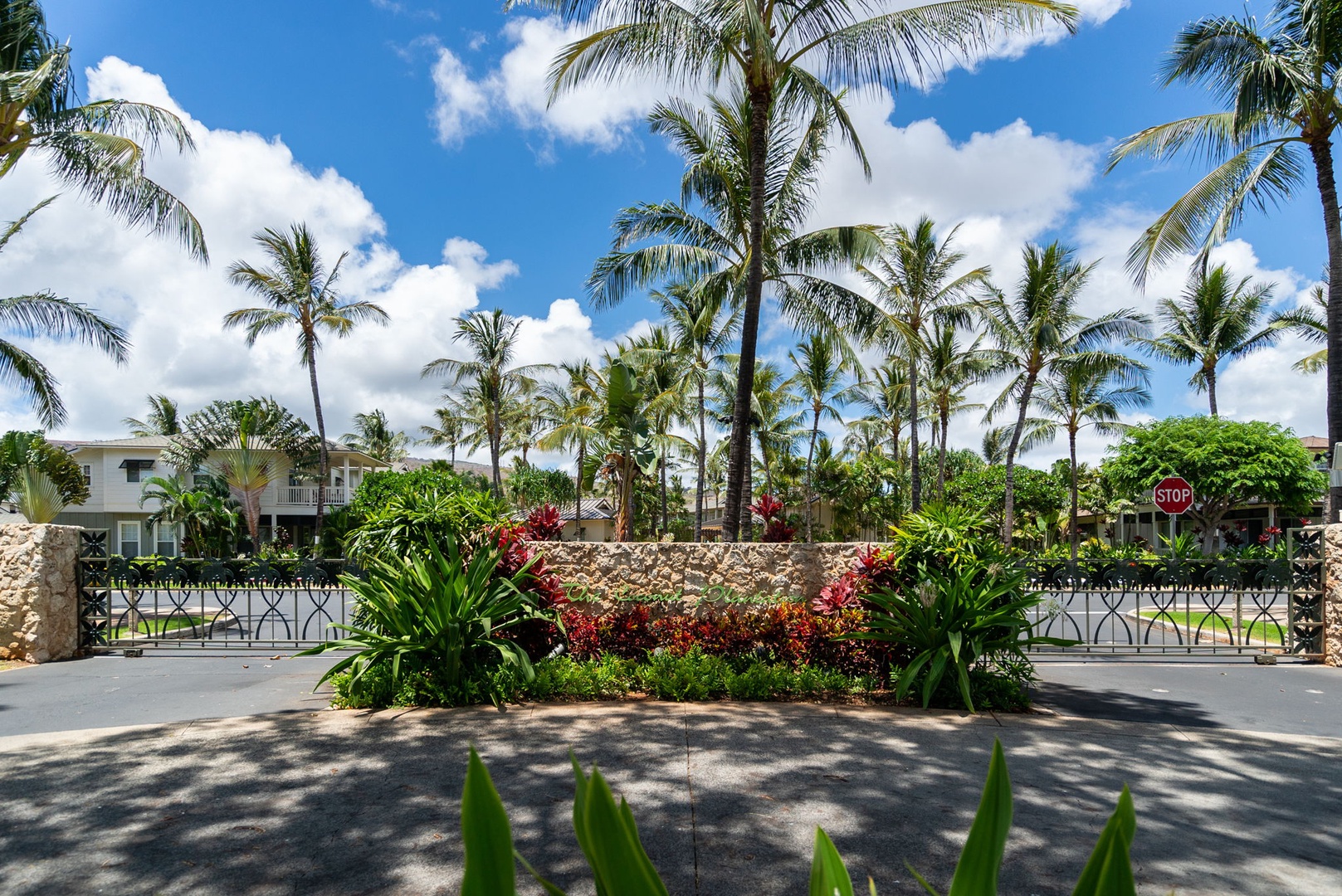 Kapolei Vacation Rentals, Coconut Plantation 1080-4 - Stone paths and dense plantings keep the grounds feeling like a garden.