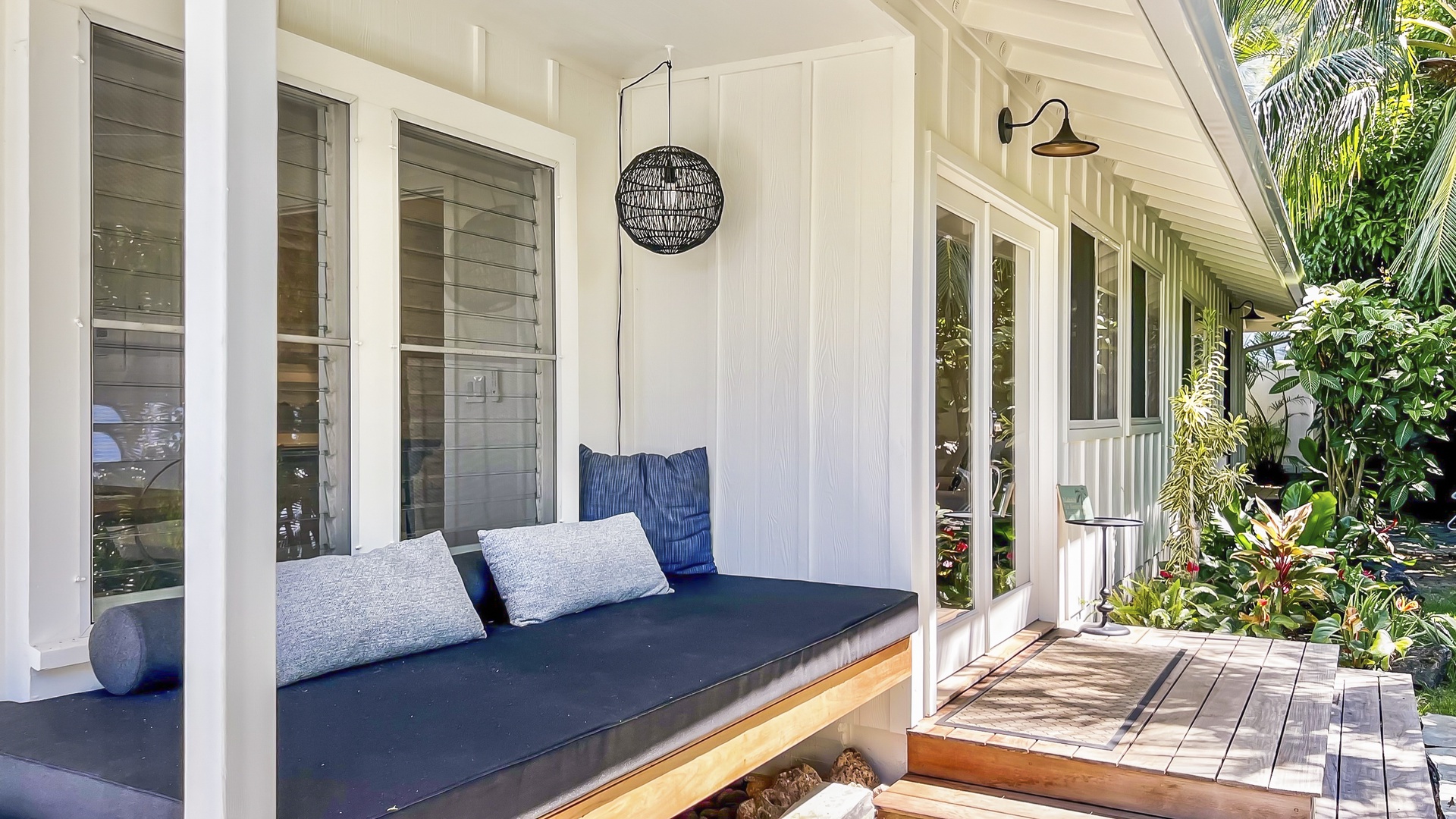 Kailua Vacation Rentals, Lanikai Ola Nani - Nestled in nature, our exterior day bed invites you to unwind and savor the beauty of the outdoors.