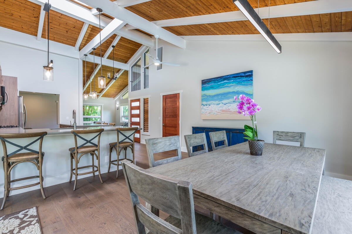 Princeville Vacation Rentals, Lani Oasis - Seating for 8 in the dining area with extra space at the breakfast bar.