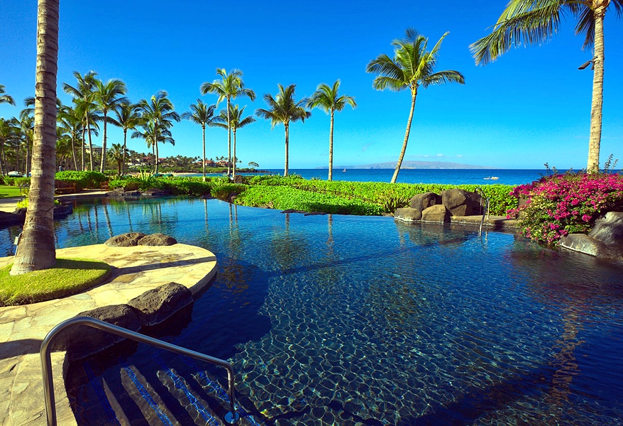 Wailea Vacation Rentals, Pacific Paradise Suite J505 at Wailea Beach Villas* - A View of the Beach Front Adult Infinity-Edge Heated Swimming Pool set...