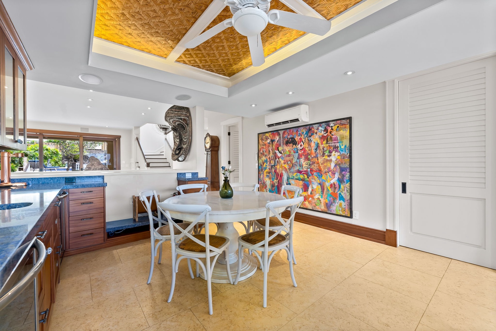 Kailua Vacation Rentals, Leaf House - The breakfast nook, where a striking woven ceiling detail and vibrant artwork create an inviting space for your tropical meals and morning coffee rituals.