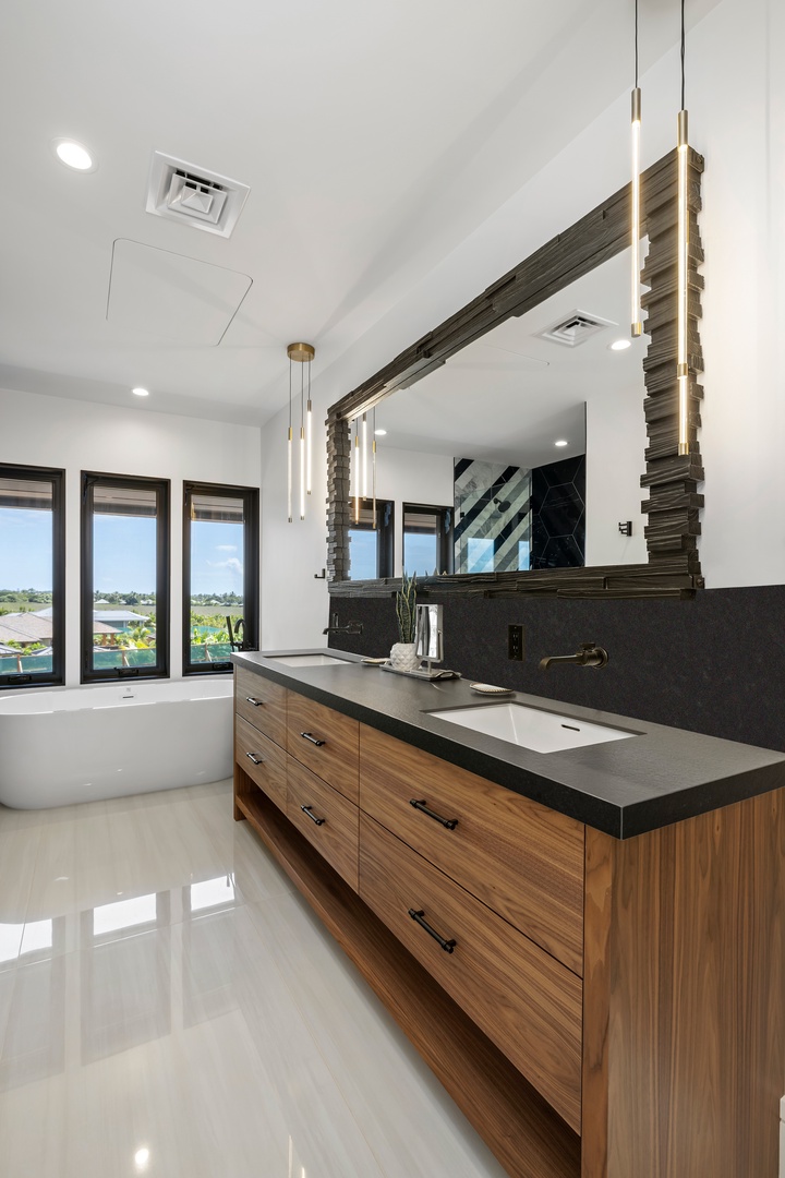 Koloa Vacation Rentals, Hale o ka Nene - Every bathroom is a retreat, featuring elegant finishes and space for refreshing after beach adventures.