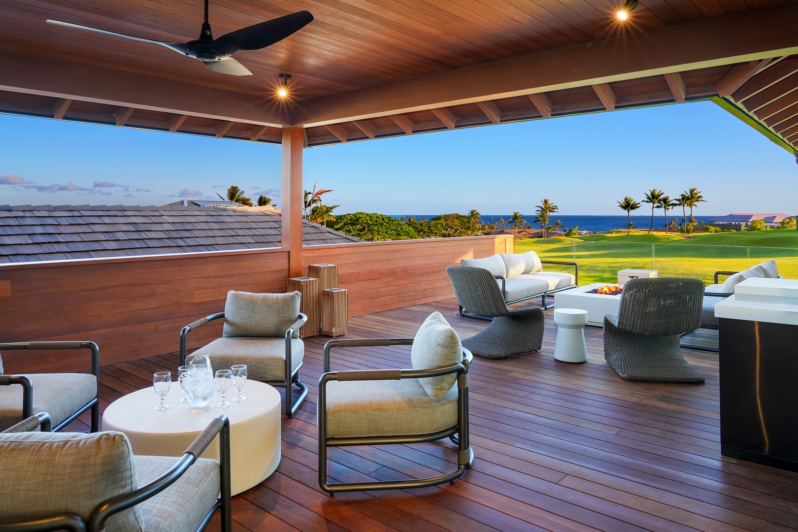 Koloa Vacation Rentals, Hale Hanohano - Expansive second lanai with lounge seating and sunset panorama.