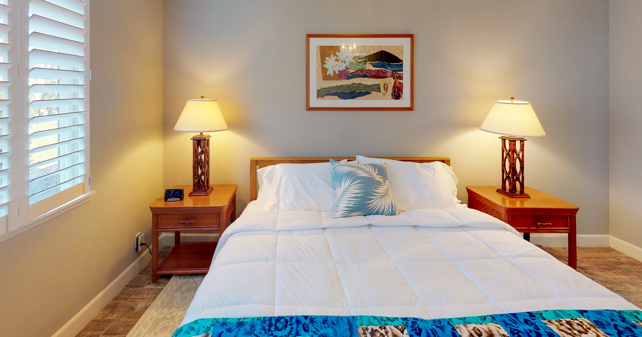 Kapolei Vacation Rentals, Ko Olina Kai 1051A - The primary guest bedroom with a framed artistry and soft linens.