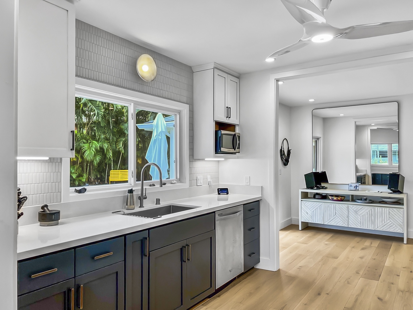 Kailua Vacation Rentals, Lanikai Ola Nani - Wash dishes with a view! Our kitchen sink offers a window to the world, turning chores into moments of serenity.