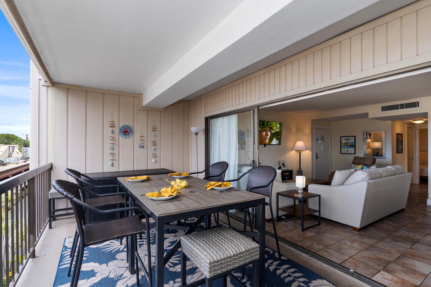 Kailua Kona Vacation Rentals, Kona Plaza 201 - Your covered lanai opens to beautiful marina views, perfect for morning coffee or sunset dinners with comfortable outdoor dining.