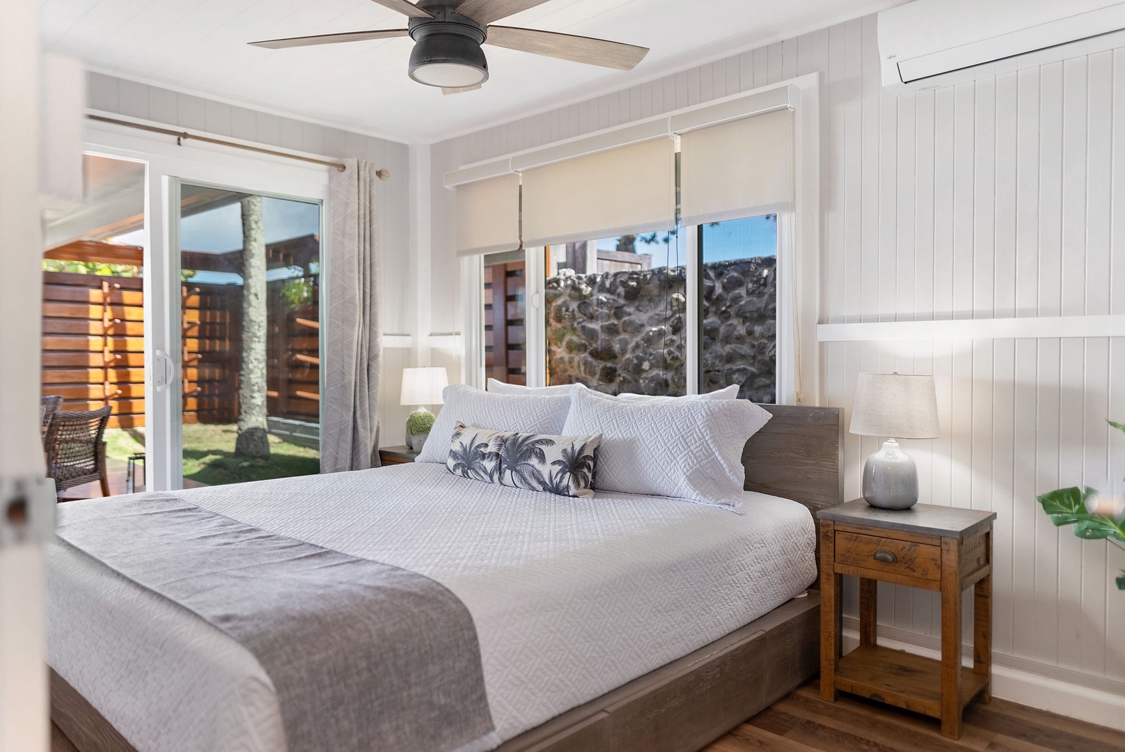 Haleiwa Vacation Rentals, Hale Nalu (Lower Level) - Main Bedroom with plush king bed and luxury linens.