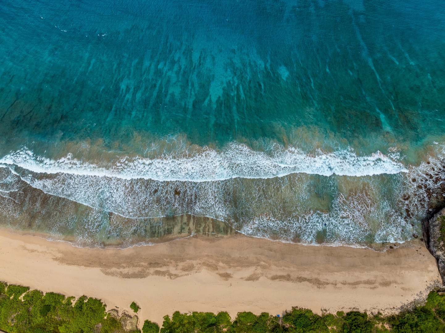Lahaina Vacation Rentals, Kapalua Ridge 1421 - Just moments from Kapalua Ridge Villas Resort, this beach features soft sands and gentle waves under a clear blue sky.