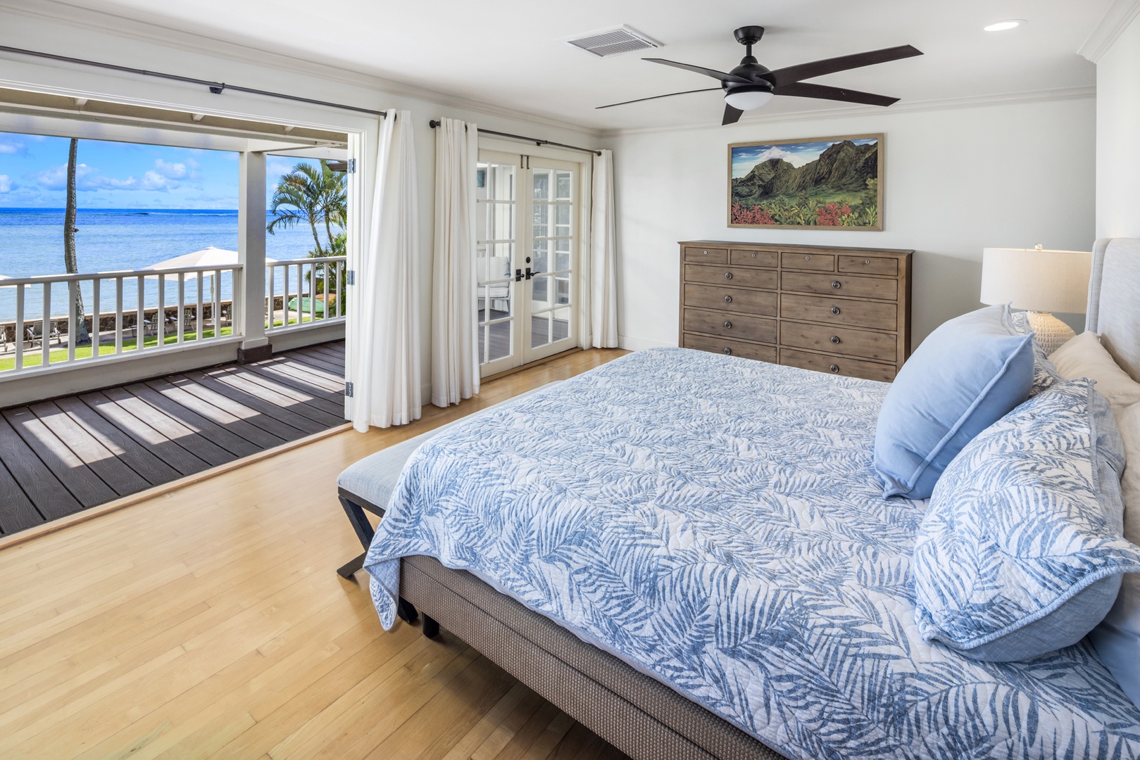 Honolulu Vacation Rentals, Moana Lani - Main House - Ocean views from the king bed, with the veranda doors a few feet away.