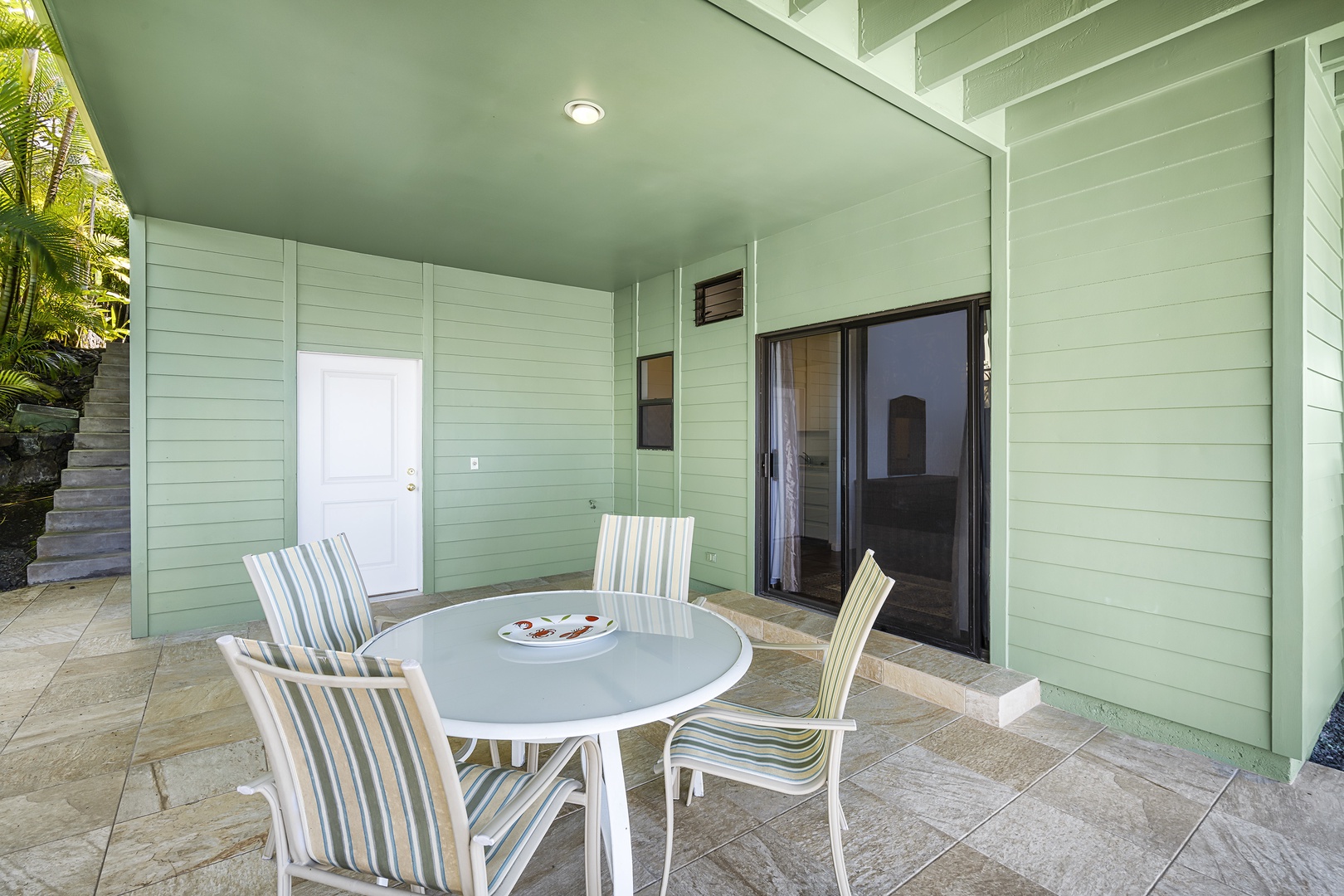 Kailua Kona Vacation Rentals, Ho'o Maluhia - Outdoor table space steps from the downstairs bedroom!