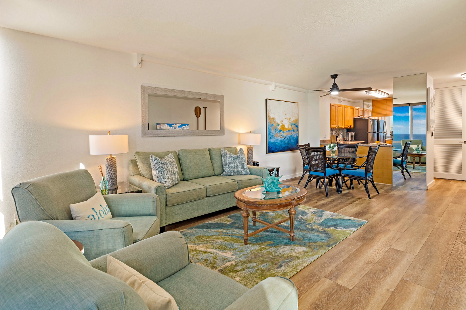 Lahaina Vacation Rentals, Mahana 718 - The living area offers a cozy retreat with comfortable seating, perfect for relaxing after a day at the beach.