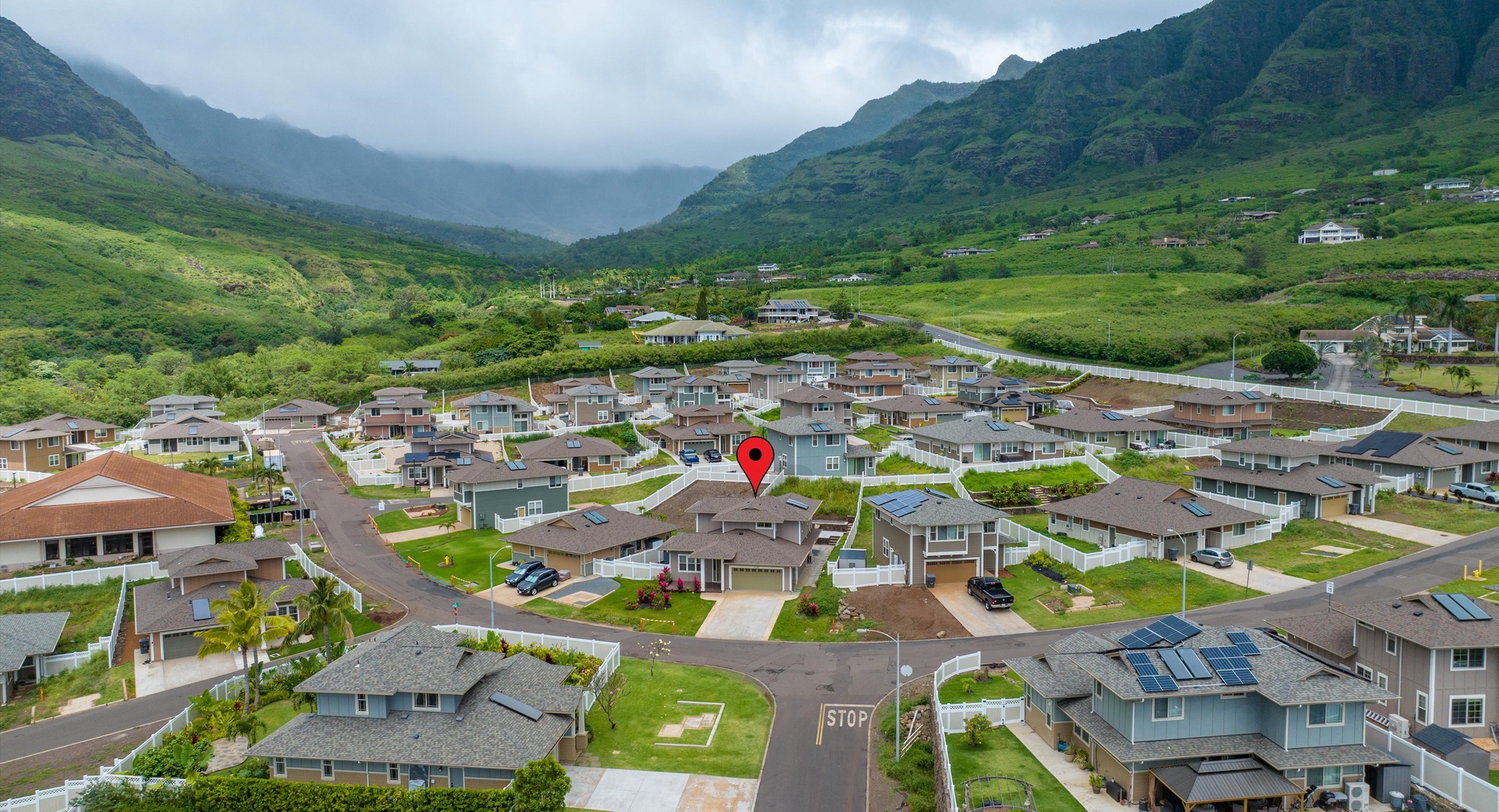 Makaha Valley Vacation Rentals, Makaha Valley Hale Kai** - Aerial perspective highlighting the home’s spot in a gated valley setting.