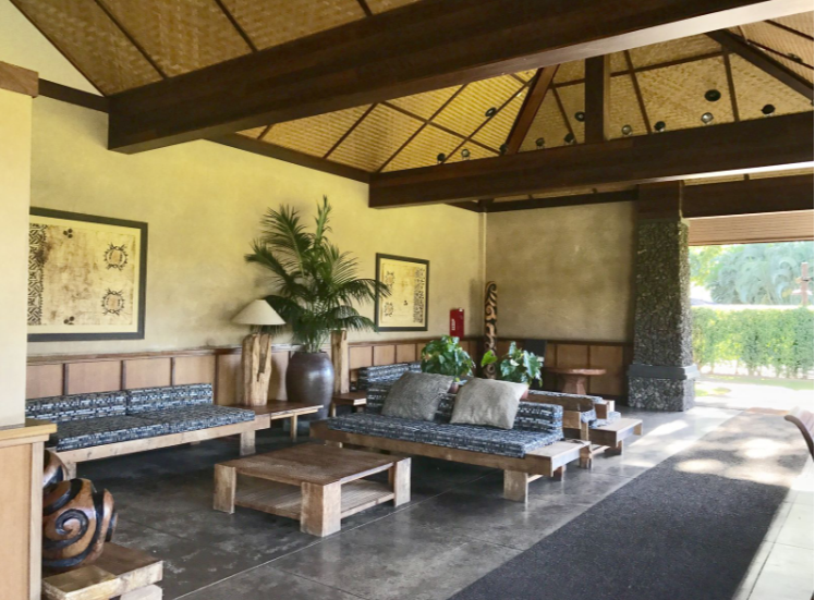 Lahaina Vacation Rentals, Aina Nalu B105 Studio - The open-air pavilion features a kitchen, a dining table for 12+, bar seating, barbecue grills, couches, and a television.