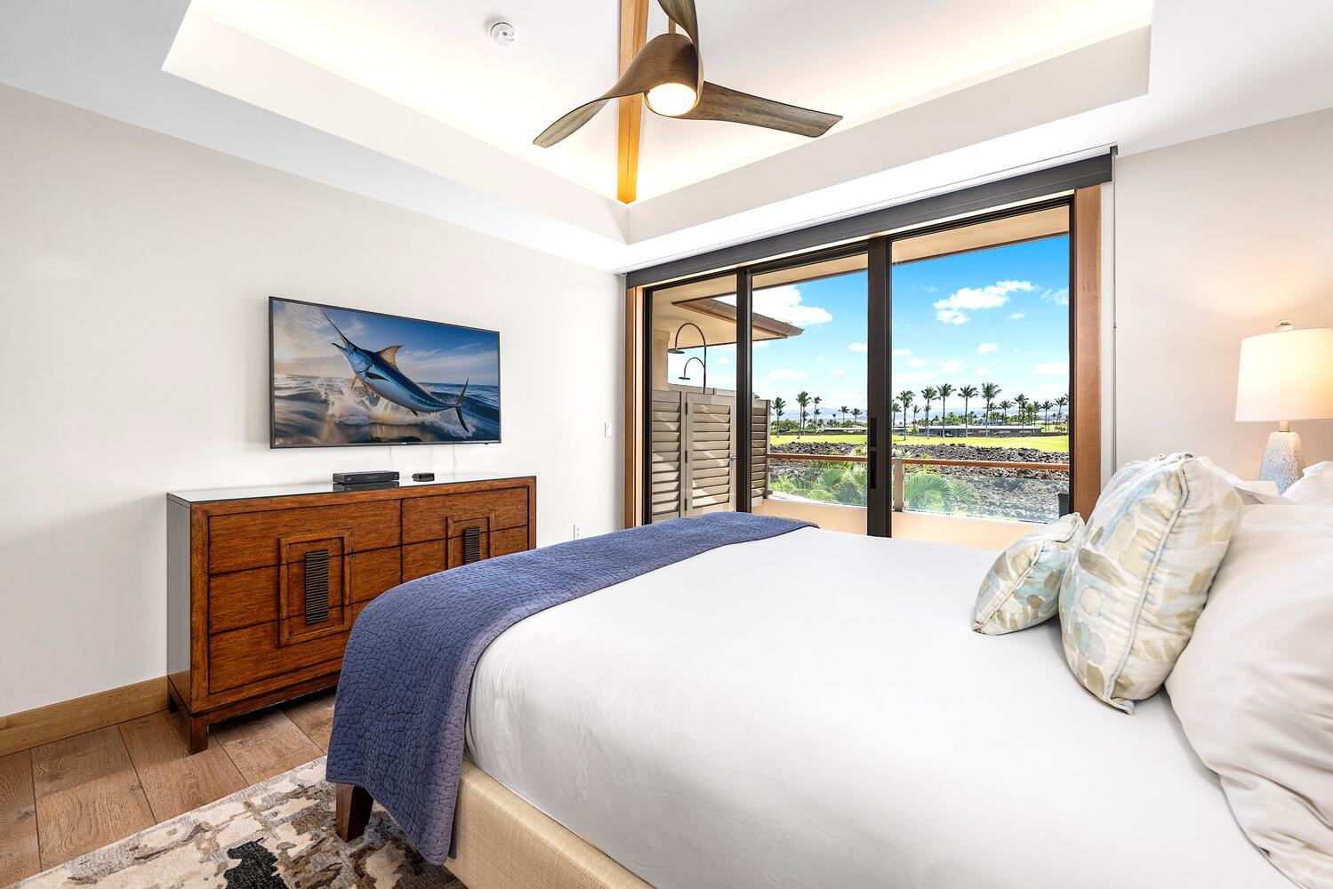 Kamuela Vacation Rentals, Laule'a at the Mauna Lani Resort #14 - Spacious guest suite with king bed and direct access to the lanai.