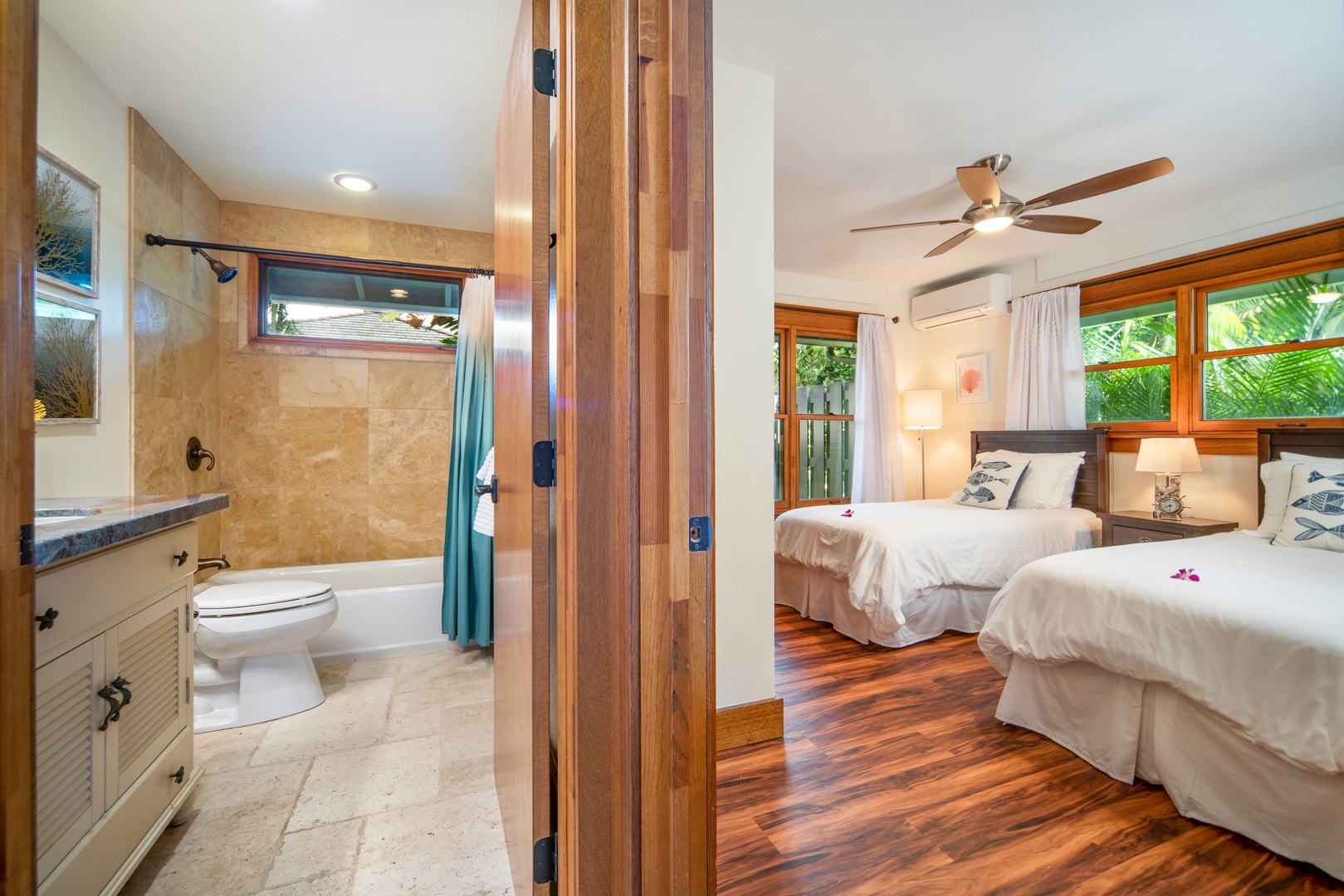 Honolulu Vacation Rentals, Hale Niuiki - A view from the living room into the twin bedroom and hallway bathroom.