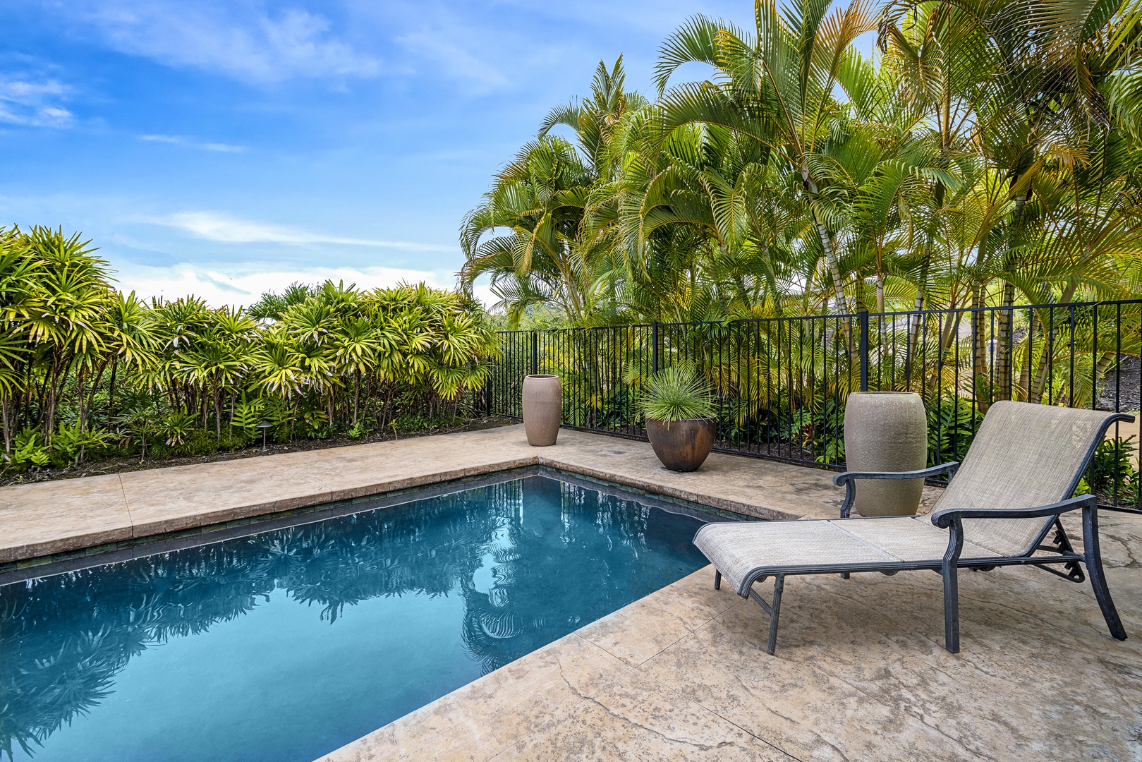 Kailua Kona Vacation Rentals, Sunset Hale - Enjoy refreshing swims in your private natural stone lap pool surrounded by lush palms.