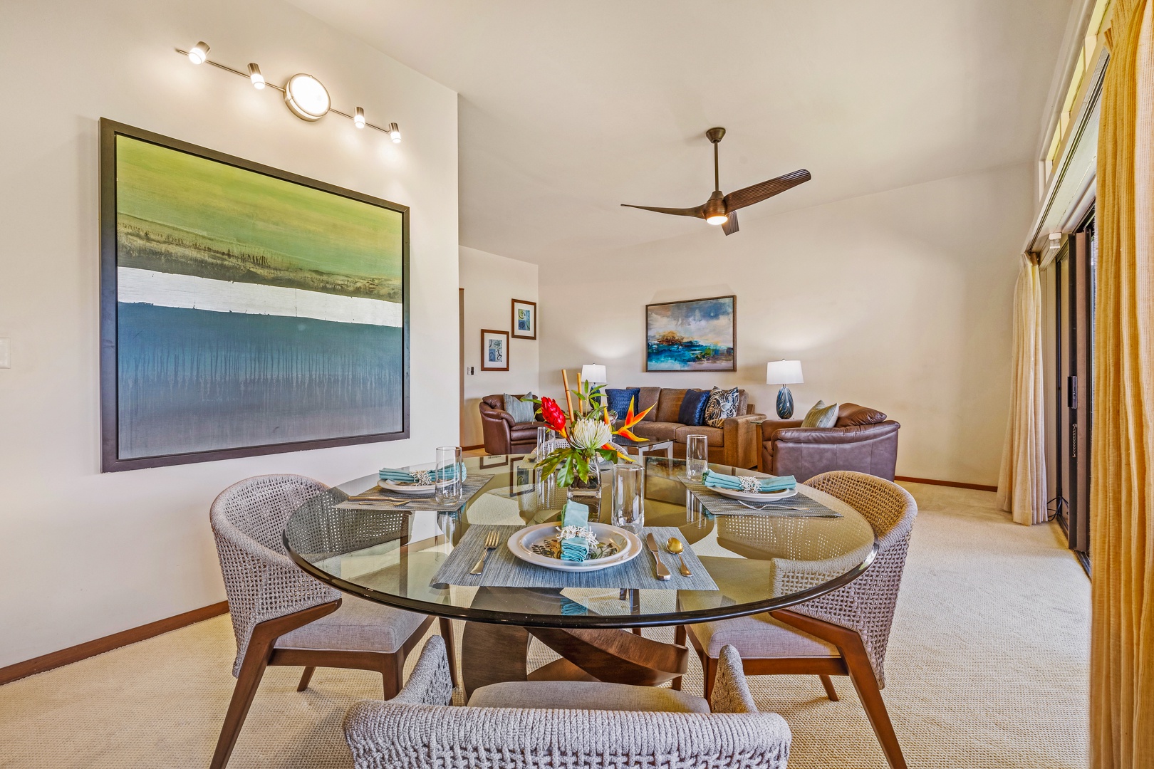 Lahaina Vacation Rentals, Kapalua Ridge 2321 - The dining area features a stylish glass table and cozy seating, perfect for enjoying meals with family or friend