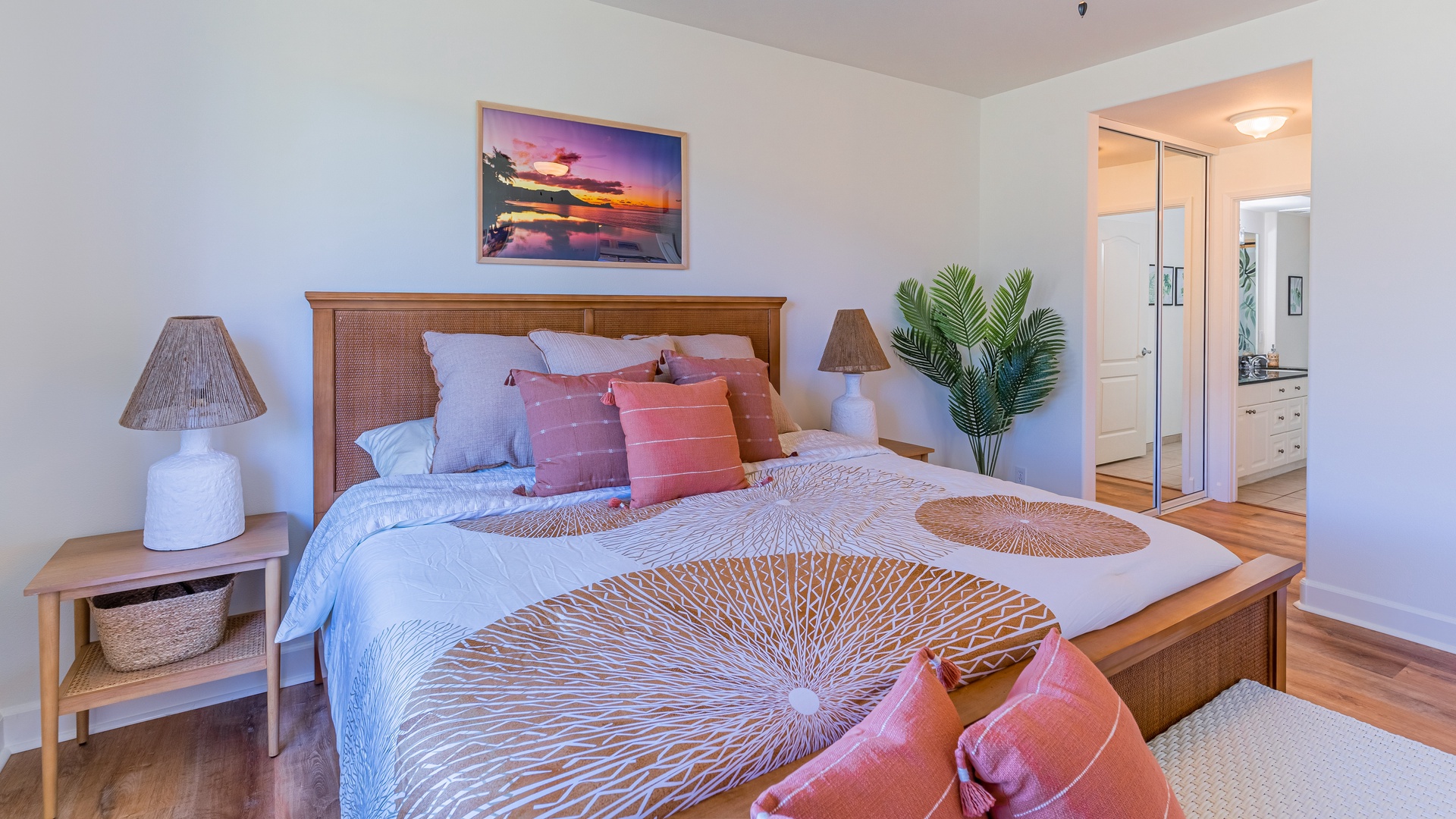 Kapolei Vacation Rentals, Ko Olina Kai 1033A - The primary guest bedroom with picture perfect design, luxury and closet space.