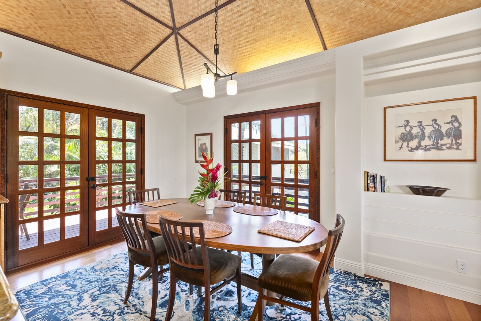 Haleiwa Vacation Rentals, Kealoha Tropical Beach Villa - Share meals around the mango wood and stone indoor dining table for six, with access to the deck.