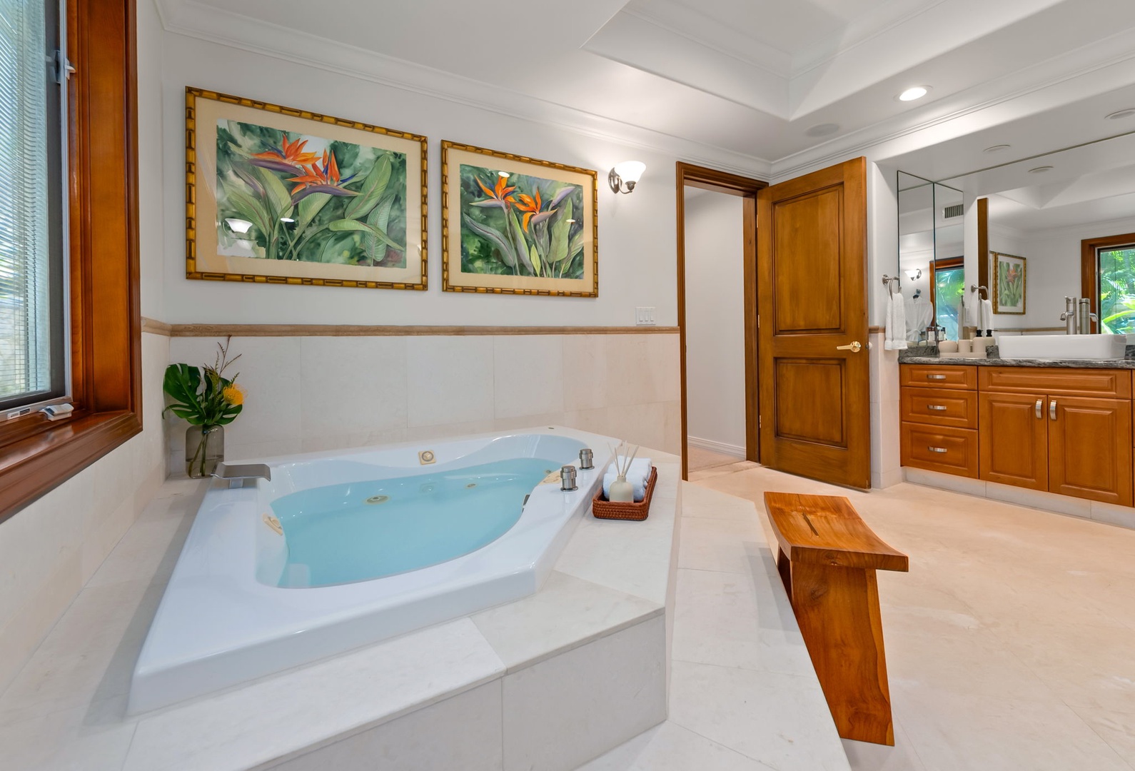 Honolulu Vacation Rentals, Maunalua Estate - A spacious soaking tub and warm island-inspired accents create a peaceful space to unwind.