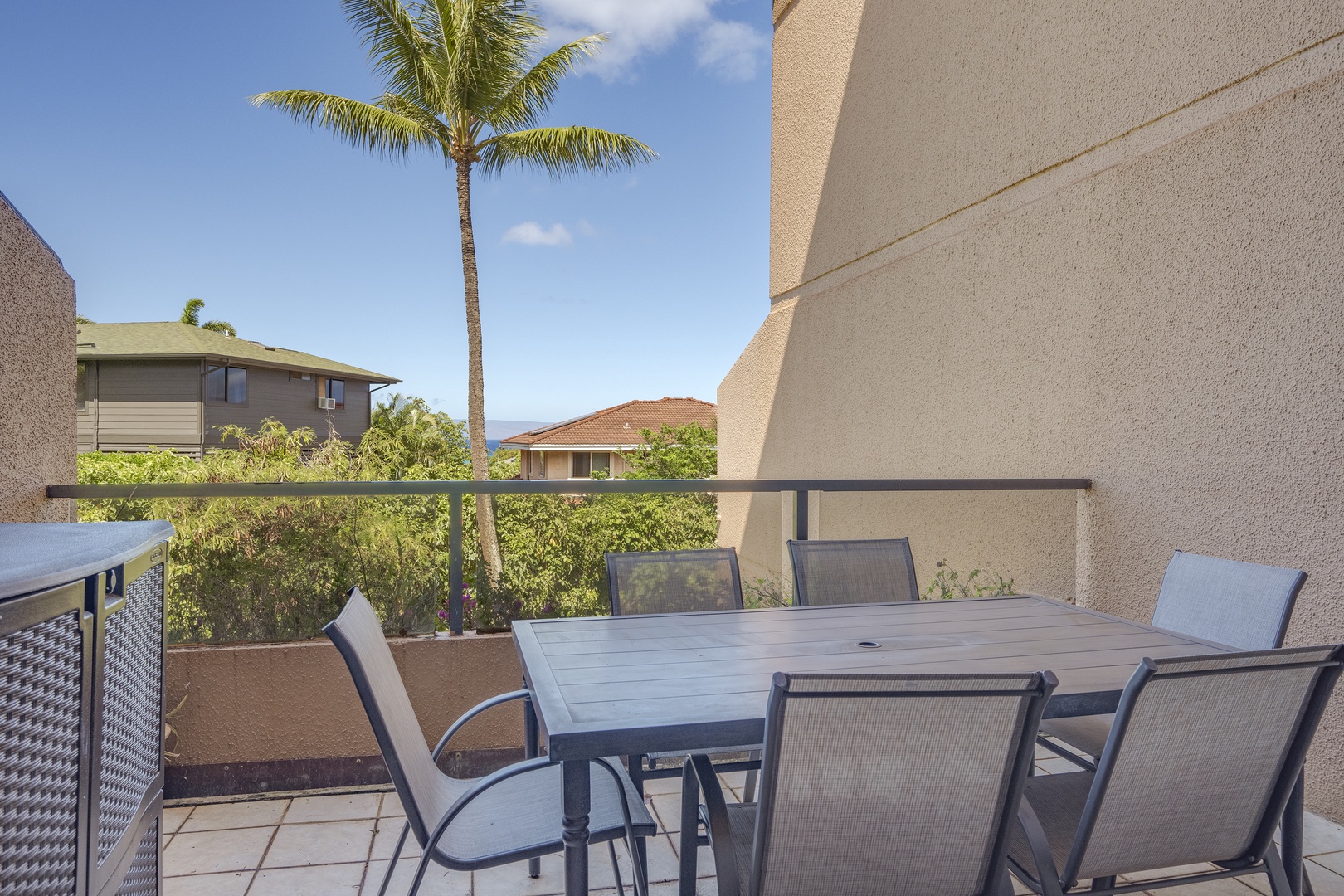 Lahaina Vacation Rentals, Kahana Villas E408 - Al fresco dining option on the lanai with natural views.