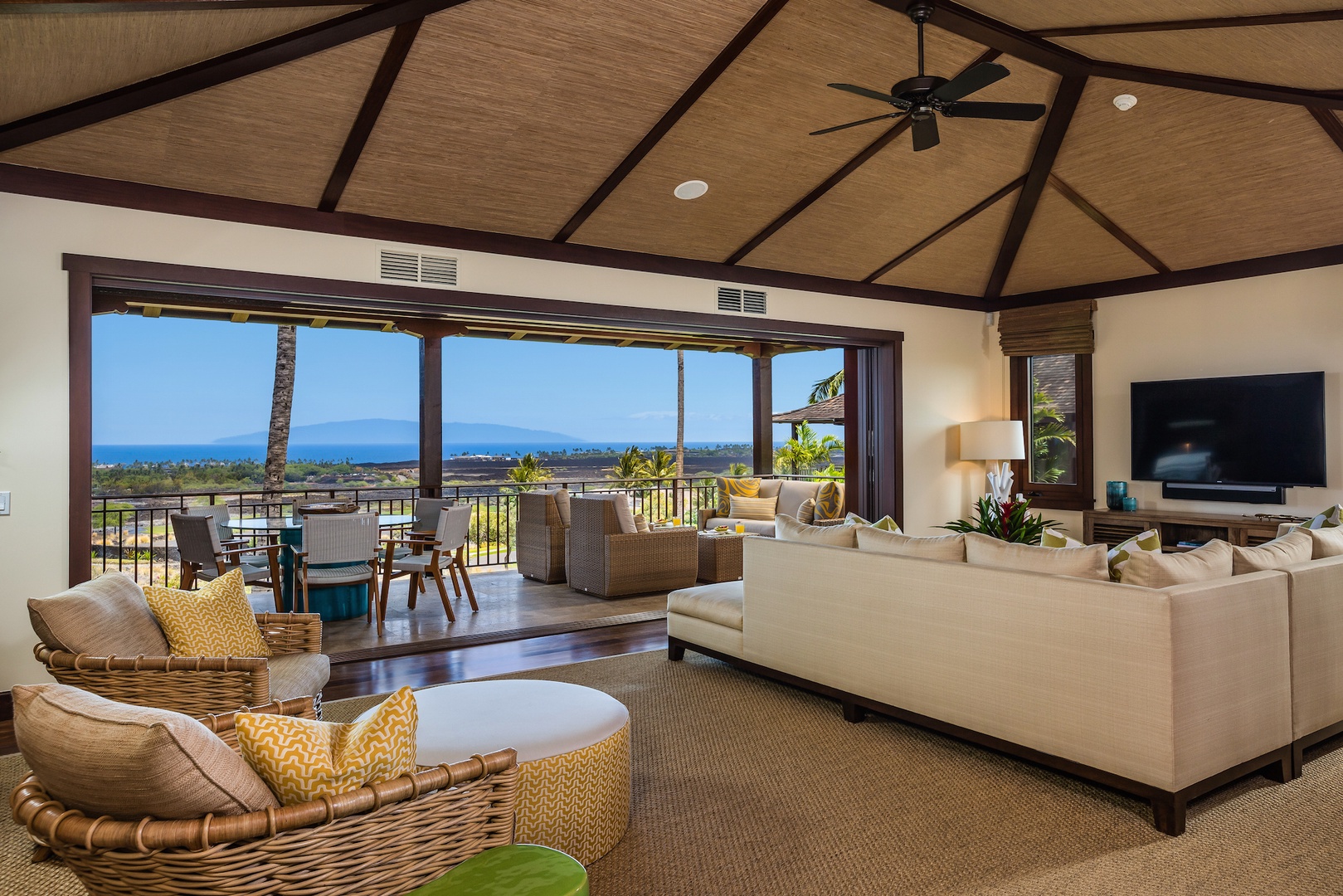 Kailua Kona Vacation Rentals, 2BD Hali'ipua Villa (108) at Four Seasons Resort at Hualalai - Abundant natural light and ocean views in the living area, with sliding glass pocket doors out to the lanai.