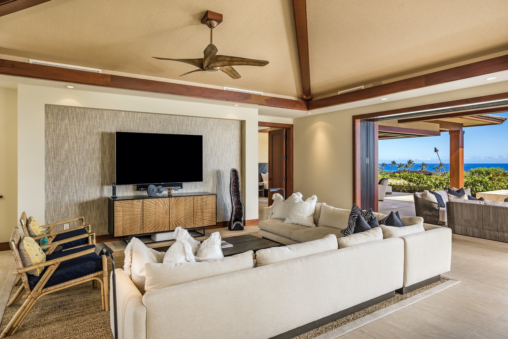 Kailua Kona Vacation Rentals, 4BD Kulanakauhale (3558) Estate Home at Four Seasons Resort at Hualalai - The living area’s wraparound plush seating, inset entertainment wall with 75” smart flat screen TV and Sonos audio system provide entertainment perfection.