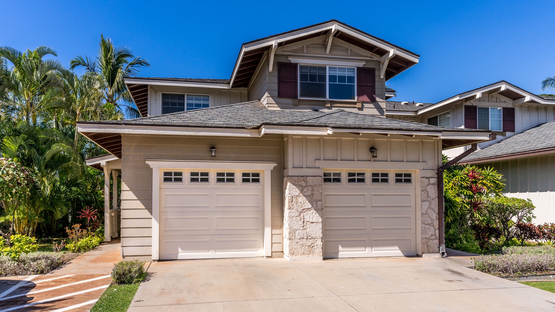 Kapolei Vacation Rentals, Ko Olina Kai 1033A - The paved area near the garage of the condo.