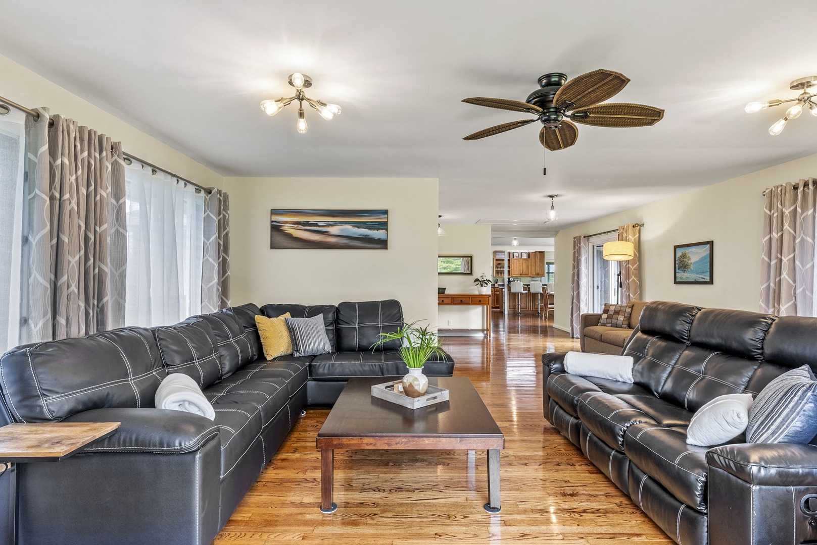 Hauula Vacation Rentals, Mau Loa Hale - Open concept living space with natural wood flooring