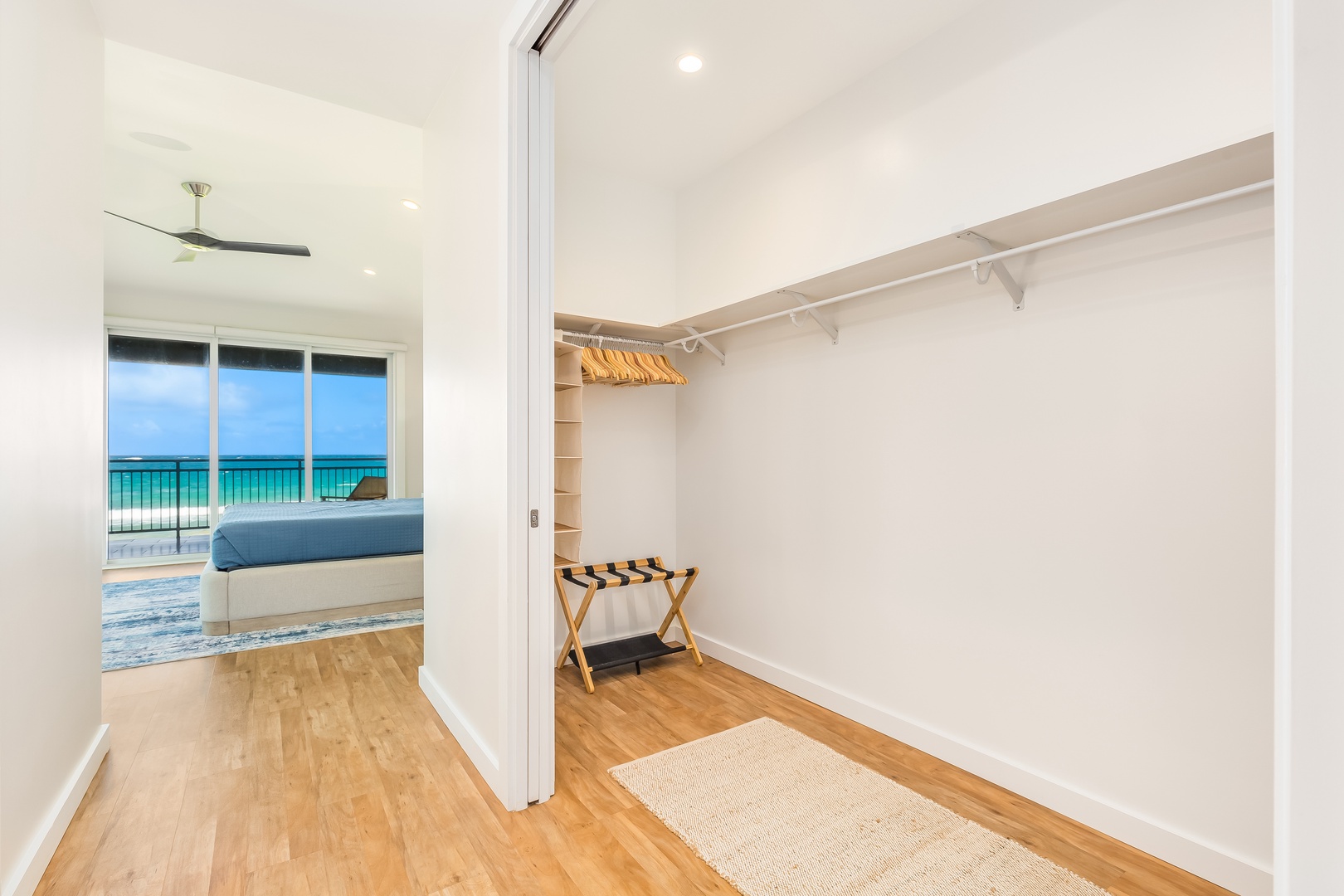 Laie Vacation Rentals, Majestic Mahakea Oceanfront Oasis - Walk-in closet with built-in storage and seamless access to the Primary bedroom.