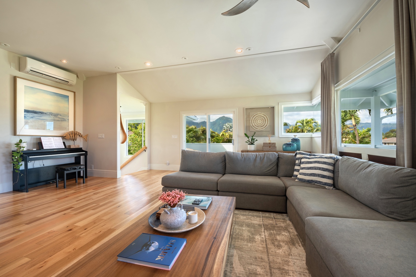 Princeville Vacation Rentals, Hihimanu House - Bright living room with modern furniture and natural light.