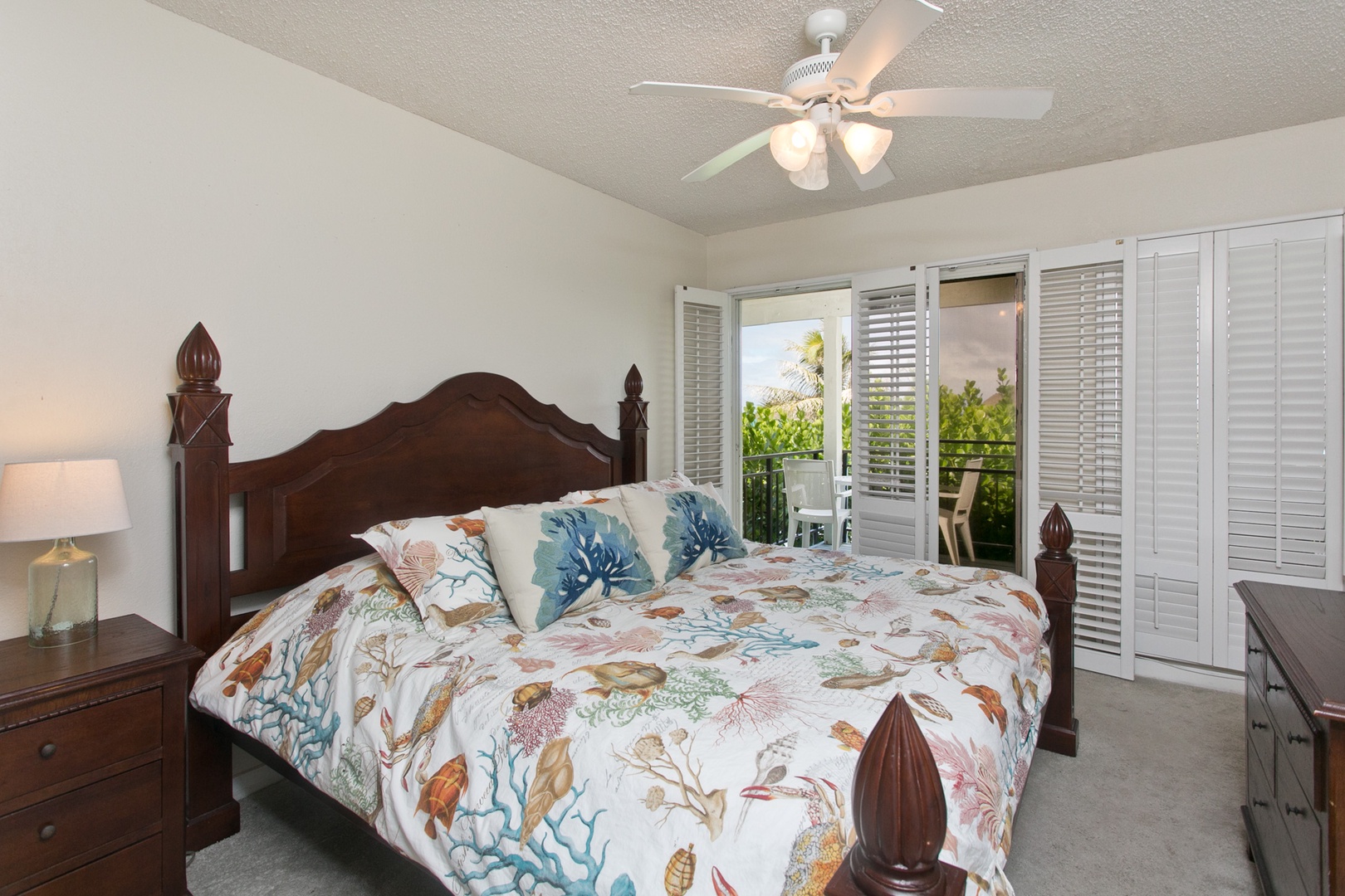 Kailua Vacation Rentals, Lanikai Village* - Hale Kolea: Guest bedroom with a plush king bed and private lanai.