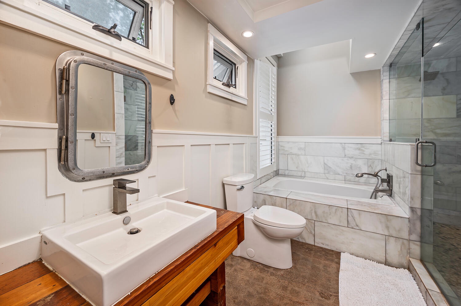 Haleiwa Vacation Rentals, Mele Makana - The primary bedroom ensuite is a full bathroom with a 2 person shower stall and soaking tub