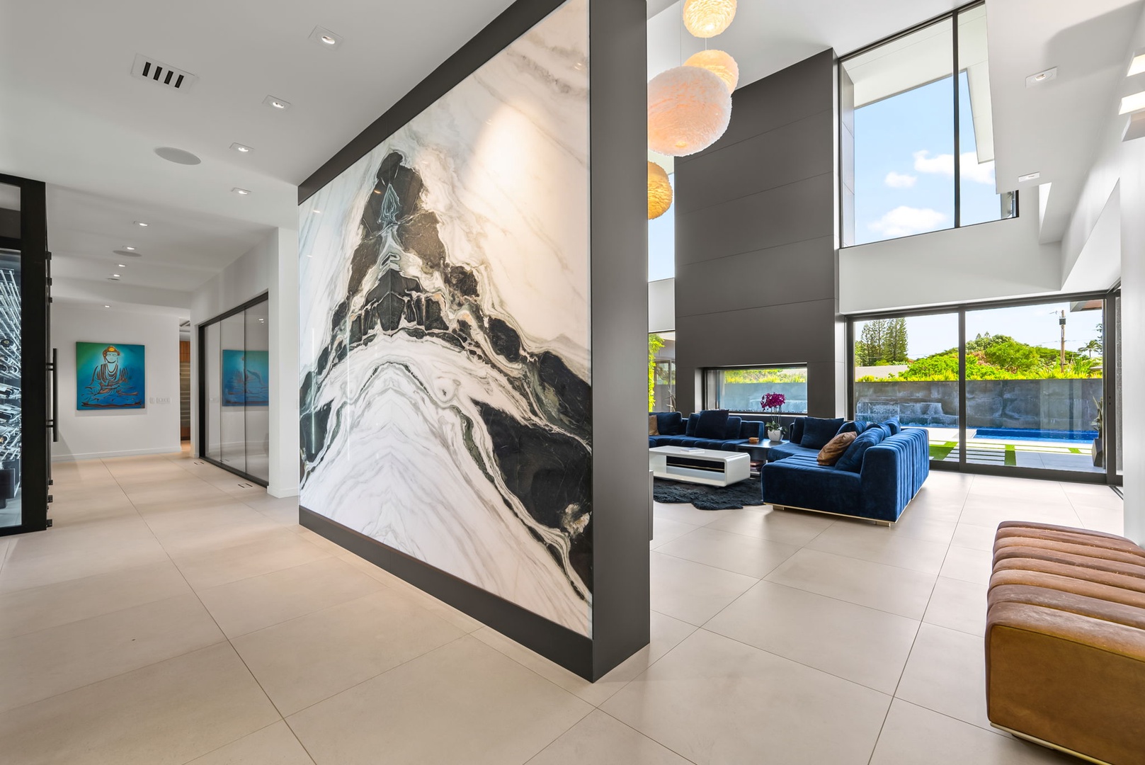 Honolulu Vacation Rentals, Ocean Villa Emilie - Bold art installations line the great room hall, anchoring the space in contemporary Hawaiian elegance.