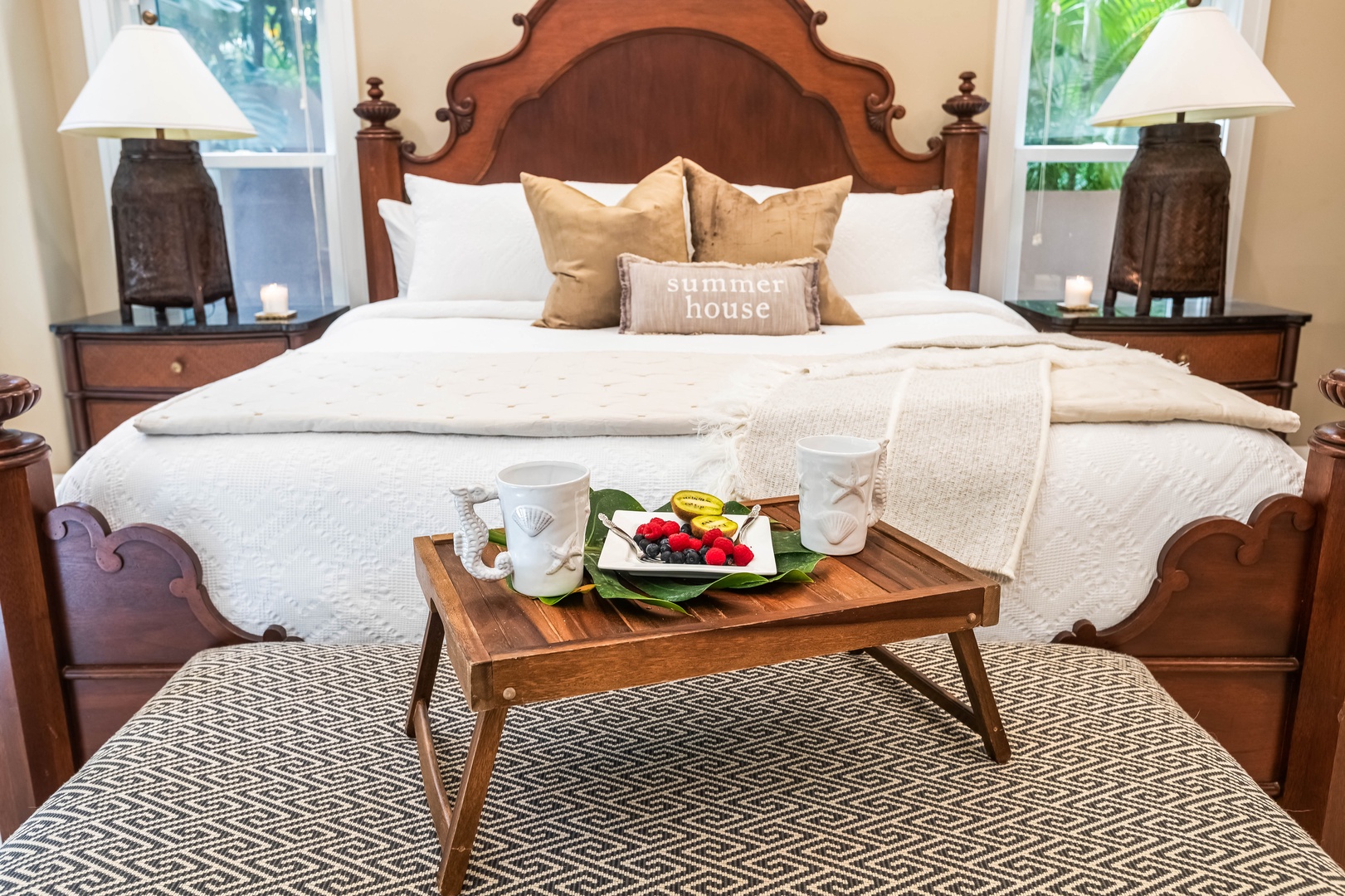 Honolulu Vacation Rentals, Pili Pono - Guest suite with tray service setup and stylish headboard.
