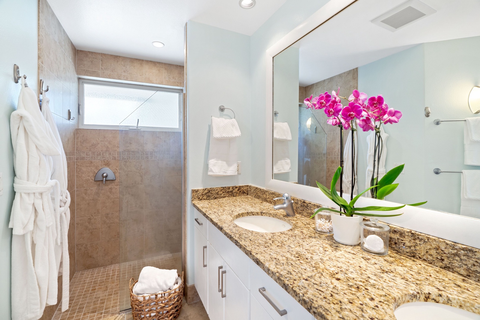 Princeville Vacation Rentals, Tropical Elegance - Guest ensuite with a walk-in shower in a glass enclosure.
