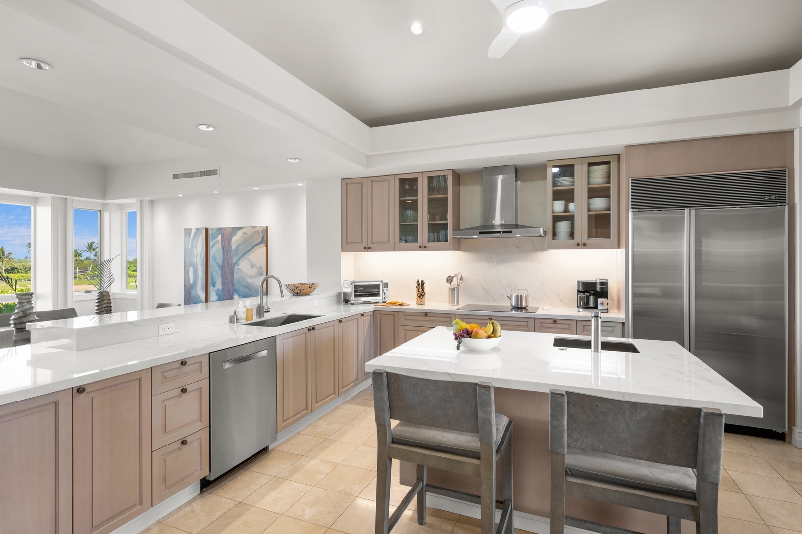 Kailua Kona Vacation Rentals, 3BD Palm Villa (130B) at Hualalai Resort - Your fully equipped chef's kitchen awaits with gleaming countertops, premium appliances, and tropical views beyond.