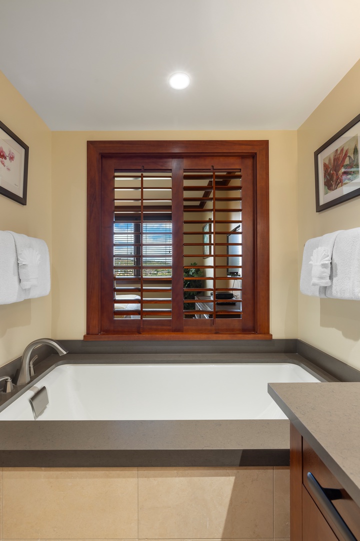 Kapolei Vacation Rentals, Ko Olina Beach Villas O1004 - Enjoy a relaxing soak in the large bathtub after a day of exploration.
