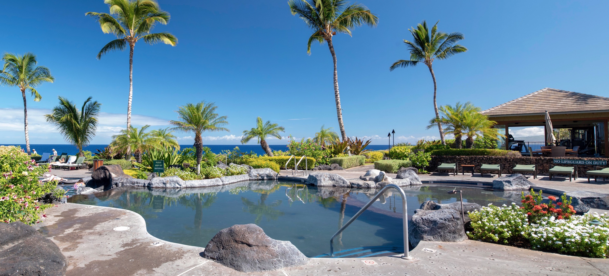 Waikoloa Vacation Rentals, 3BD Hali'i Kai (12G) at Waikoloa Resort - Hali'i Kai Resort's private swimming pool w/ multi levels and depths (fitness center in background)