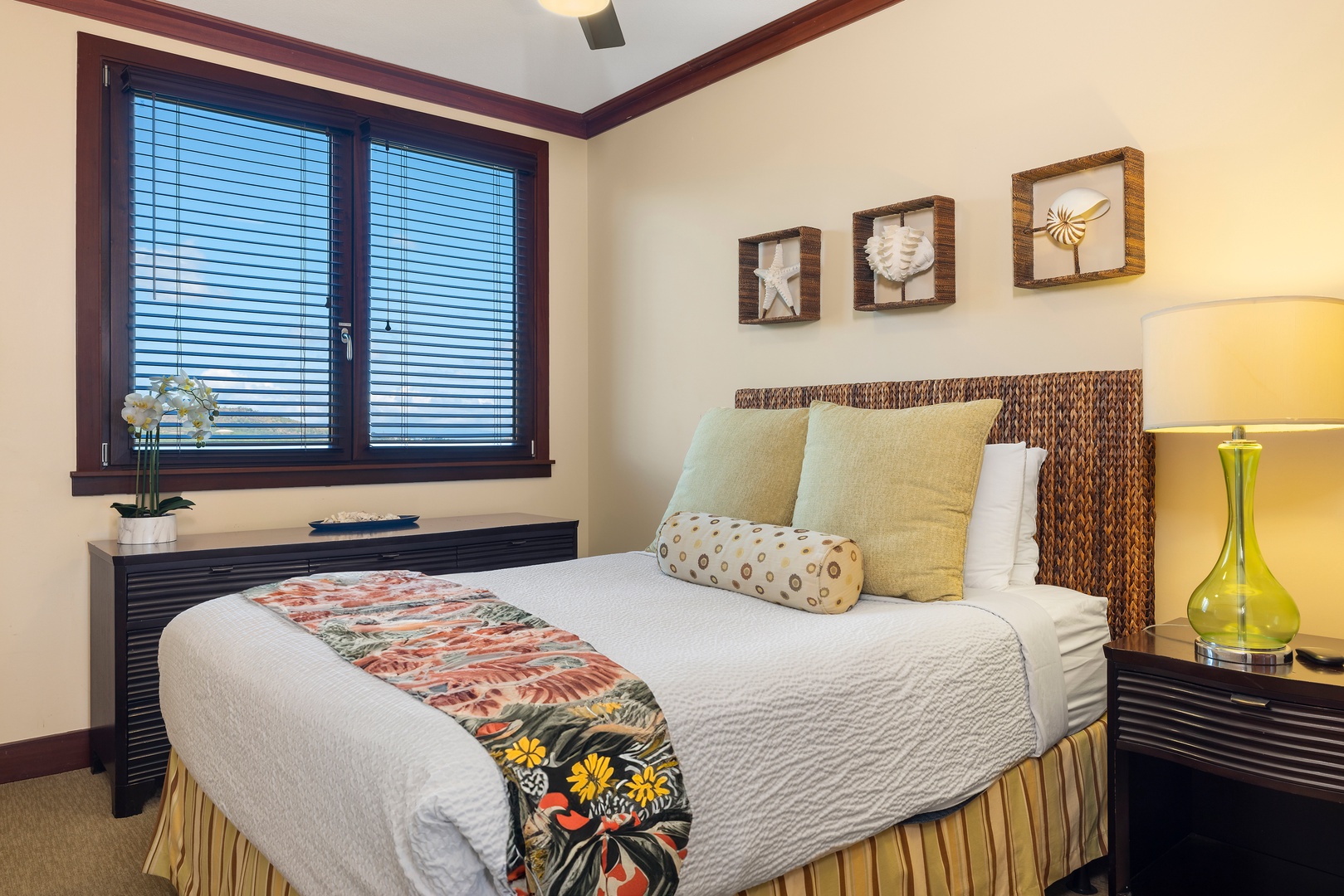 Kapolei Vacation Rentals, Ko Olina Beach Villas O1105 - The guest bedroom features a queen bed and natural lighting.