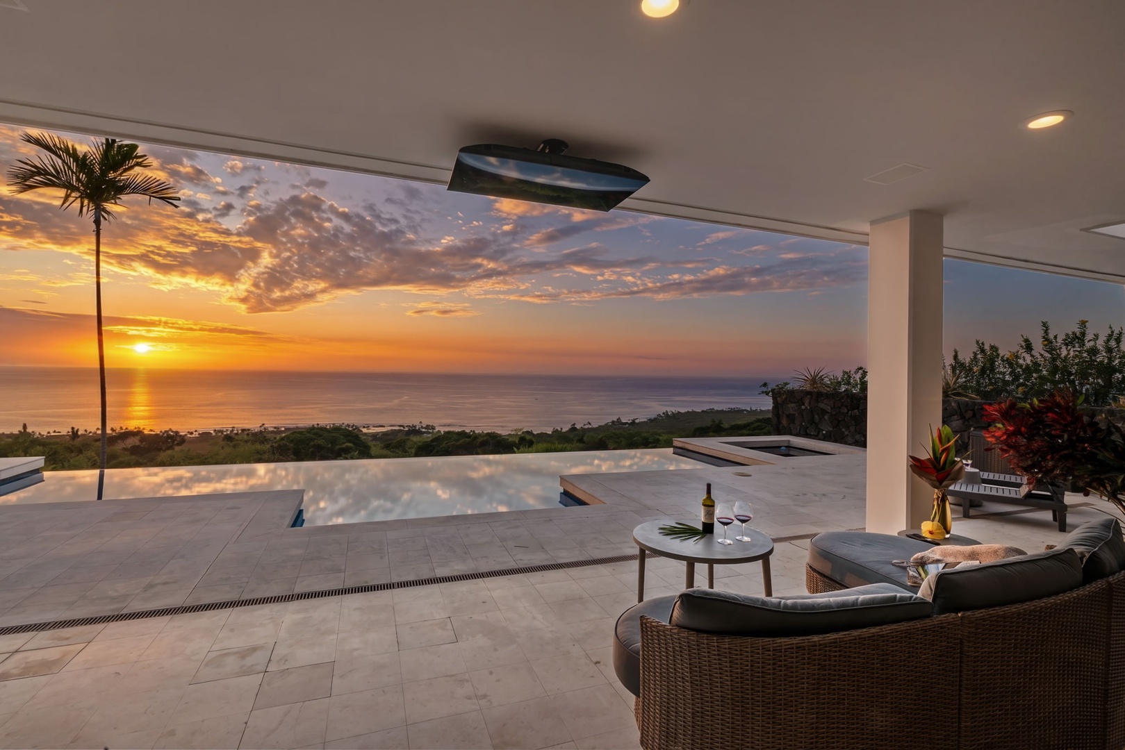 Kailua Kona Vacation Rentals, Hale Nai'a - Unwind on your private terrace with infinity pool views as golden sunsets paint the ocean horizon each evening.