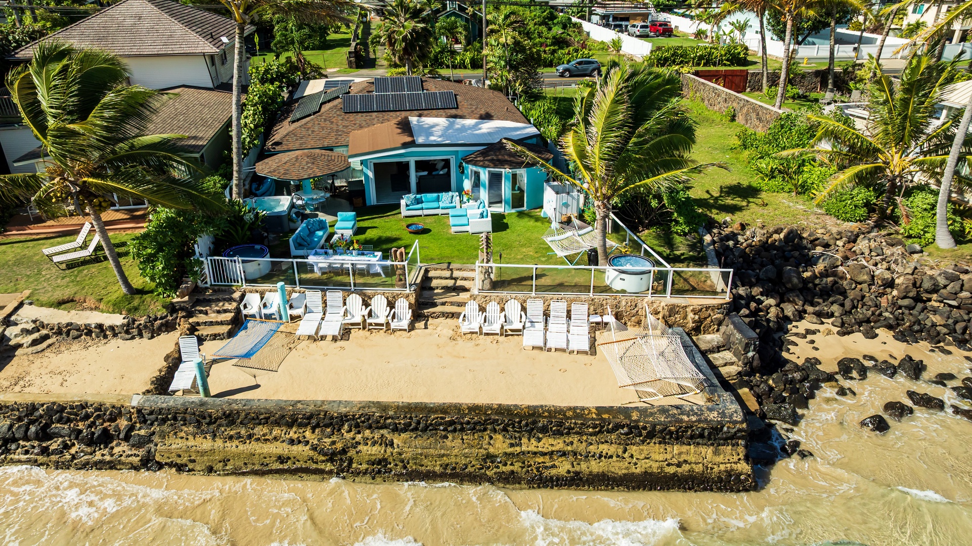 Hauula Vacation Rentals, Private Beach Paradise - Beachfront estate with expansive lawn and direct access to sandy shoreline.
