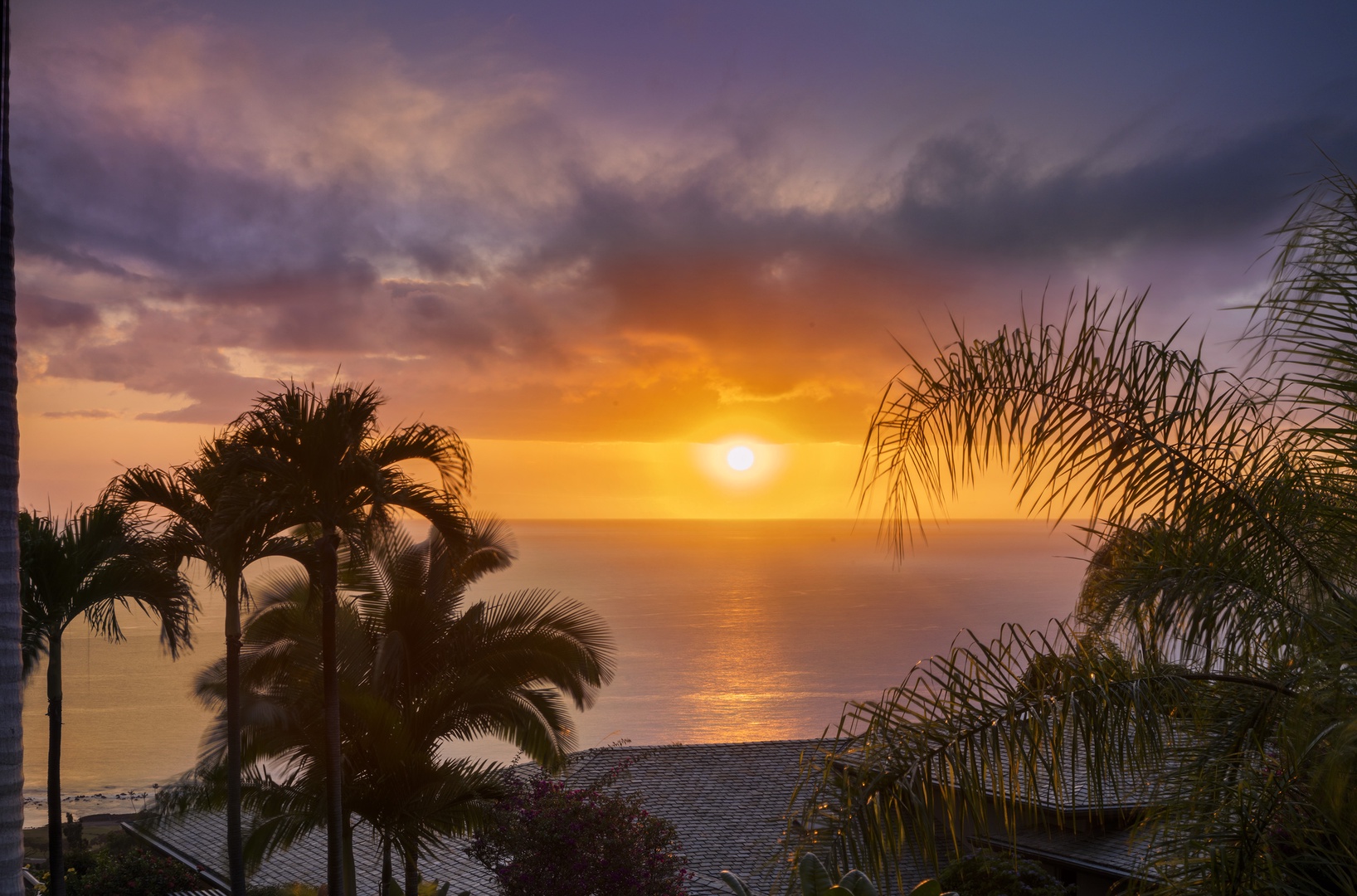 Kailua Kona Vacation Rentals, Pineapple House - Sun setting over the ocean at Pineapple House!