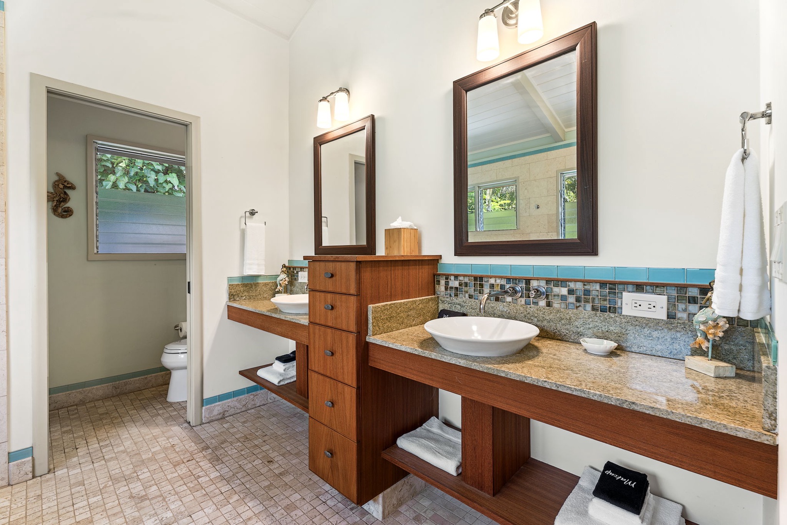 Kamuela Vacation Rentals, Island Time Retreat - Dual vanities provide ample space to get ready for the day, with natural light brightening the bathroom.