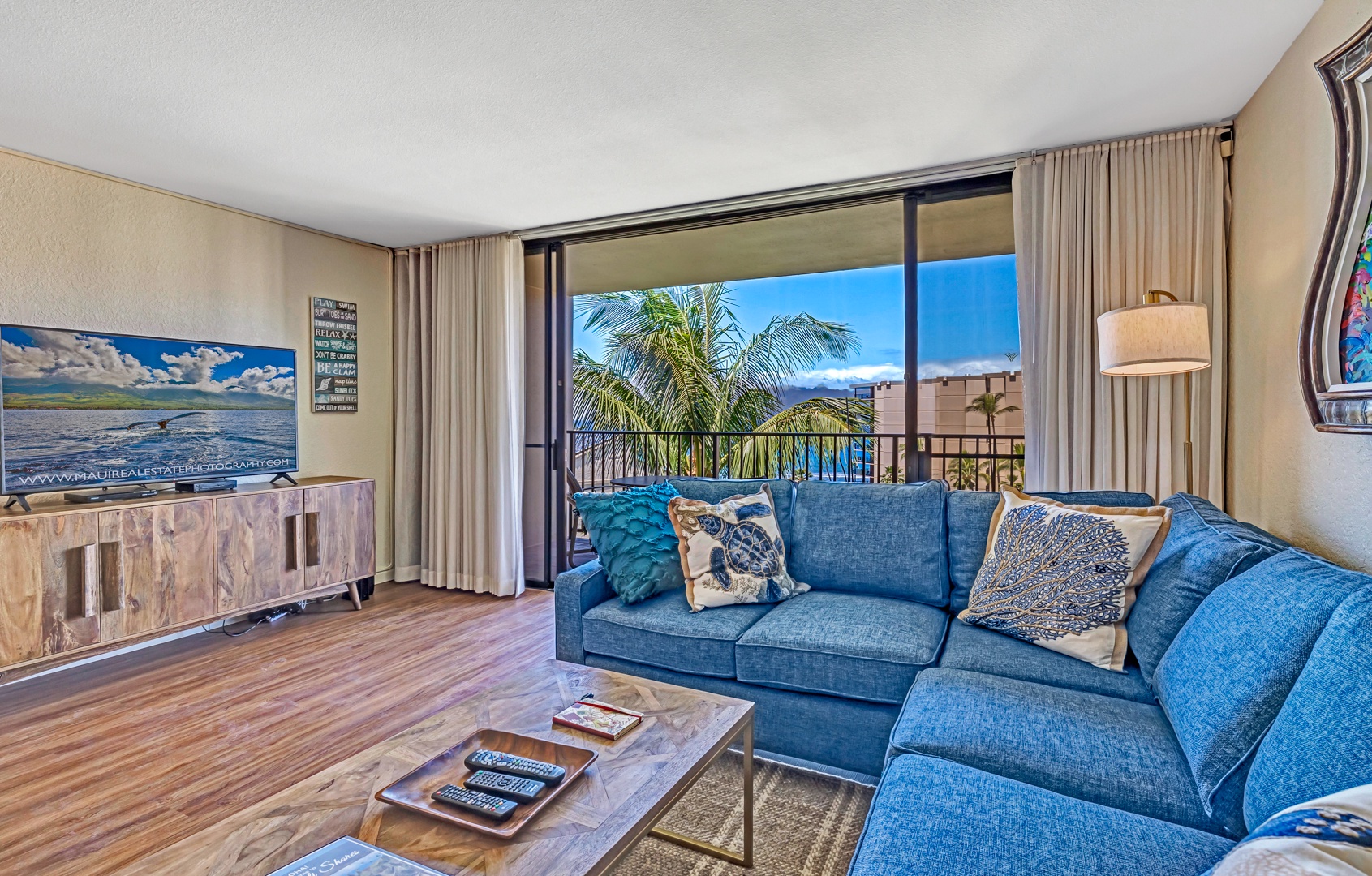 Lahaina Vacation Rentals, Kaanapali Shores 746 - Relax in the comfortable living room with views of the balcony and resort.