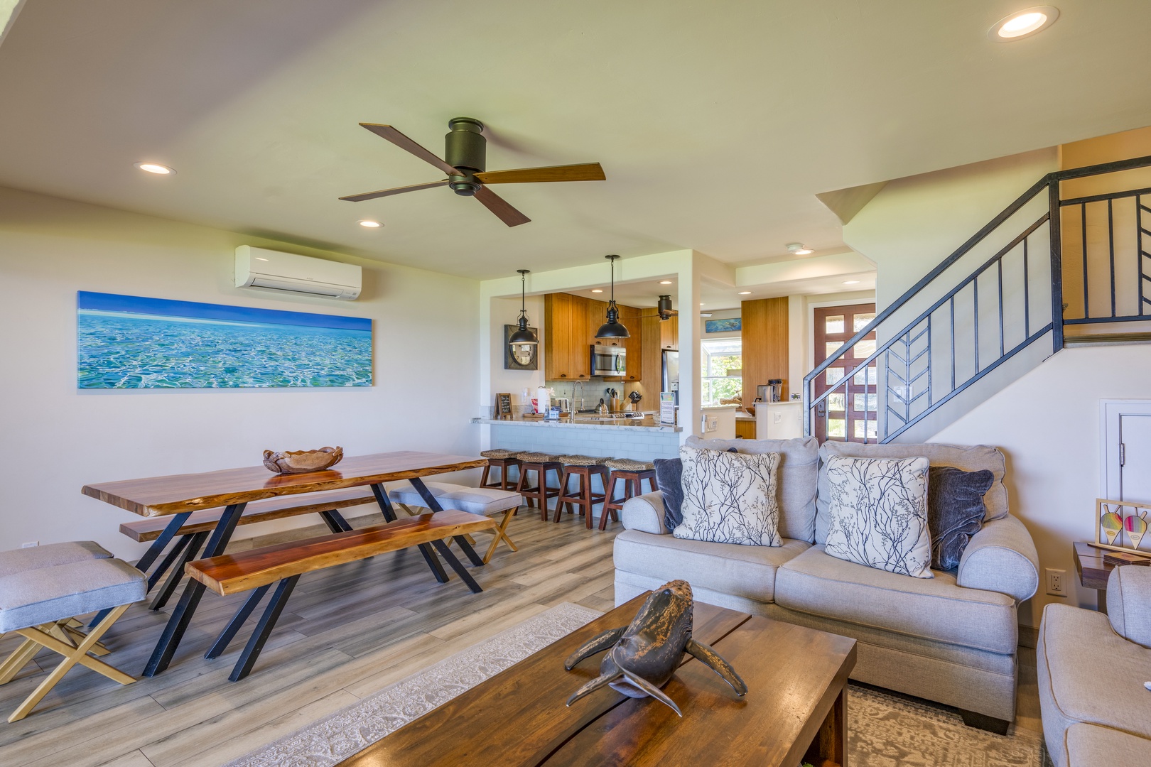 Lahaina Vacation Rentals, Puamana 240-3 - Beautifully furnished interior with natural light flowing through large windows.