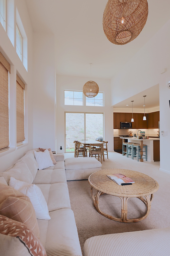 Makaha Valley Vacation Rentals, Makaha Vista Retreat** - Stay connected in this sunlit open-plan space, designed for comfort and quality time.