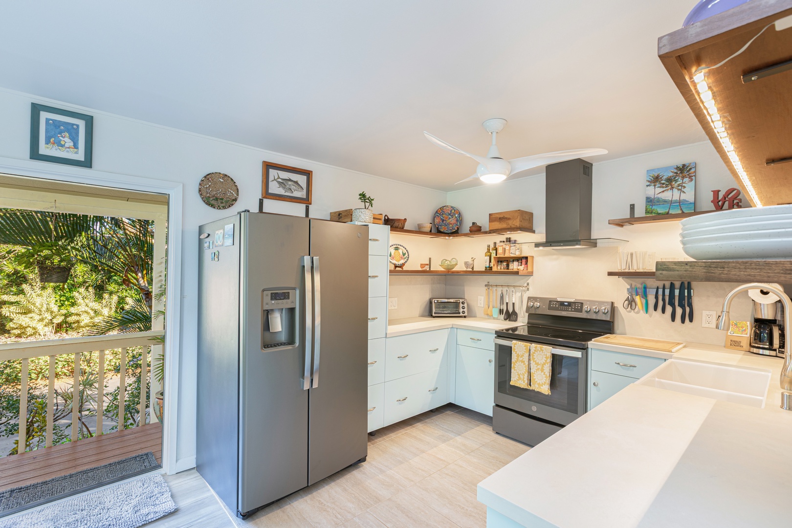 Princeville Vacation Rentals, Pohaku Kauai - Well-equipped kitchen with full-size appliances and plenty of counter space for easy vacation meals.