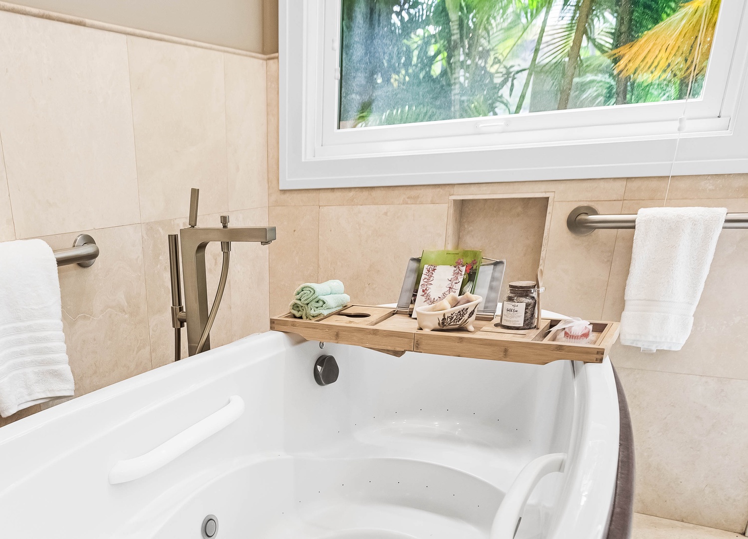 Honolulu Vacation Rentals, Pili Pono - Jetted soaking tub set beneath a breezy garden-view window.