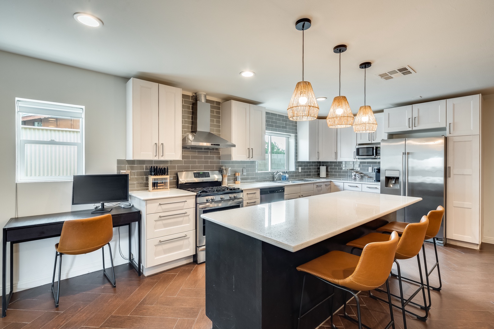 Phoenix Vacation Rentals, Desert Oasis - Adjacent to the kitchen there is a desk area with monitor